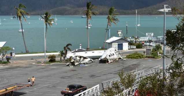 Two boats destroyed in a carpark after Cyclone Debbie