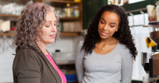 Two women talking about employment