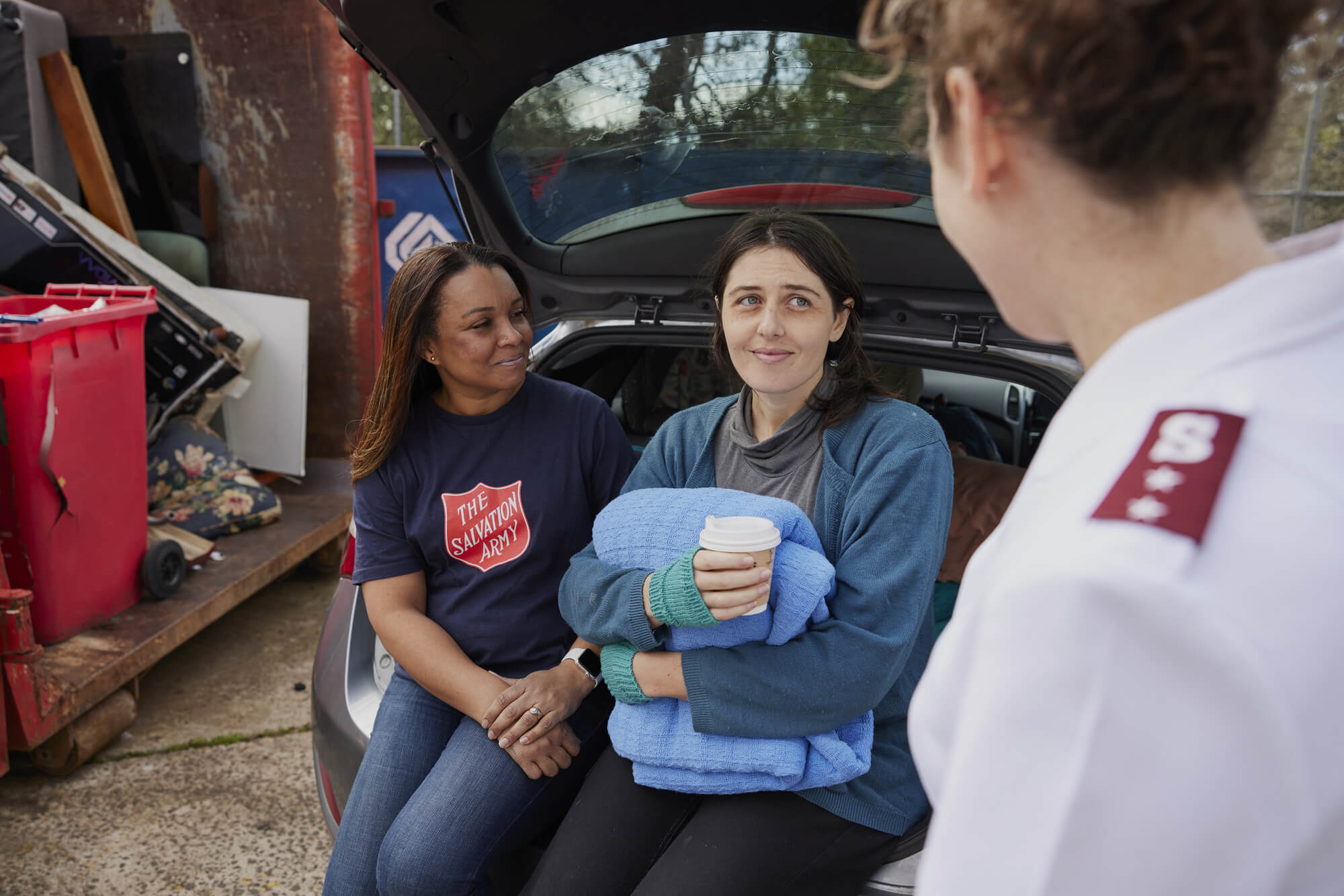 Women receiving assistance from Salvos